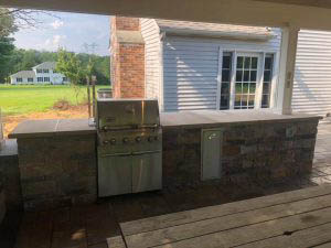 Backyard patio with grill